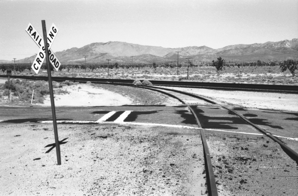 Train Tracks we Ride through Their Long, Lonely Bend